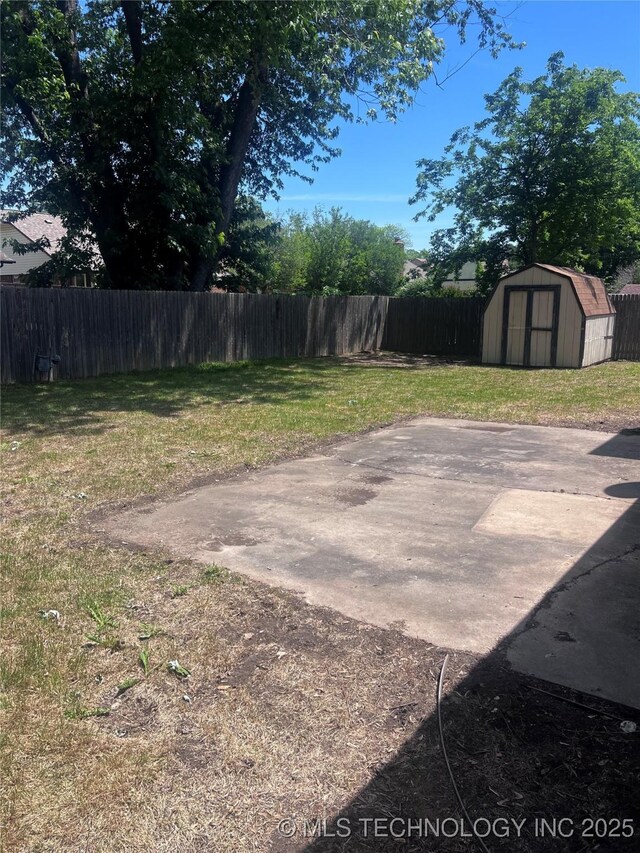 2640 W Fort Worth Pl, Broken Arrow, OK 74012 - view of yard with a shed, a patio, and an outbuilding