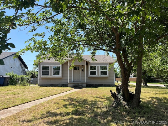 304 E 45th Ct, Tulsa, OK 74105 - bungalow featuring a shingled roof