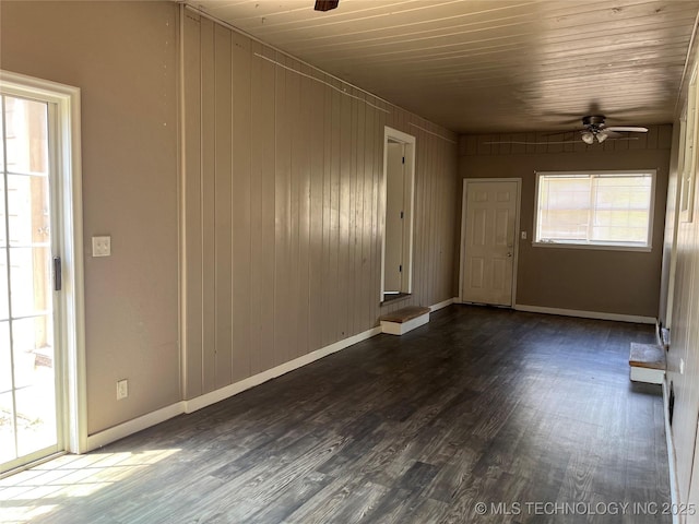 304 E 45th Ct, Tulsa, OK 74105 - unfurnished room featuring ceiling fan, dark wood finished floors, baseboards, and wooden ceiling