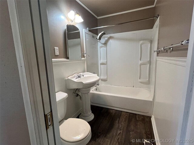 304 E 45th Ct, Tulsa, OK 74105 - full bath featuring wood finished floors, ornamental molding, toilet, and washtub / shower combination
