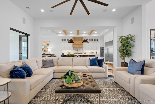 living room with recessed lighting, ceiling fan, and visible vents