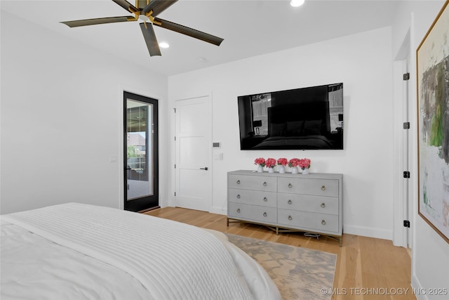 bedroom featuring baseboards, ceiling fan, recessed lighting, and wood finished floors