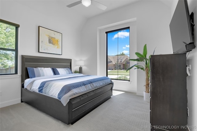 bedroom featuring baseboards, carpet flooring, and a ceiling fan