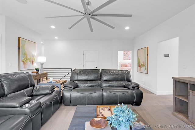 living room with recessed lighting, ceiling fan, light carpet, and baseboards