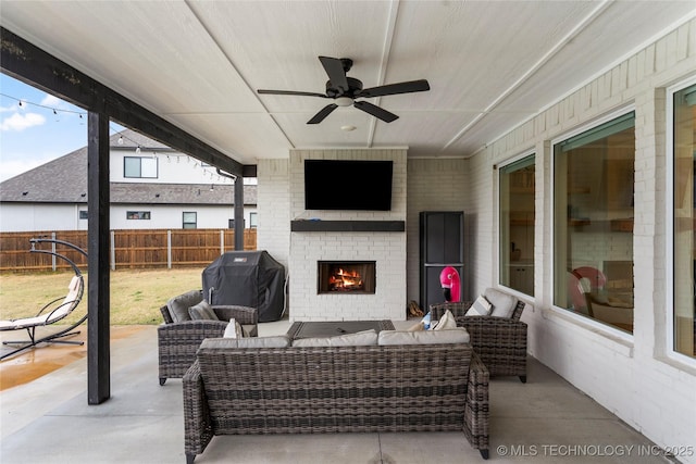 13641 S 27th St E, Bixby, OK 74008 - view of patio / terrace with a fenced backyard, ceiling fan, an outdoor living space with a fireplace, and grilling area