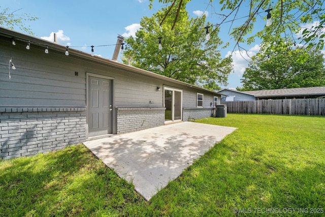 exterior space with a patio area, central air condition unit, and fence