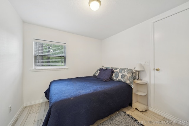 149 SE 4404th Loop, Locust Grove, OK 74352 - bedroom with light wood-style floors