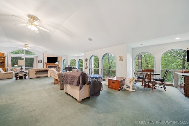 149 SE 4404th Loop, Locust Grove, OK 74352 - carpeted living area featuring ceiling fan, healthy amount of natural light, lofted ceiling, and recessed lighting