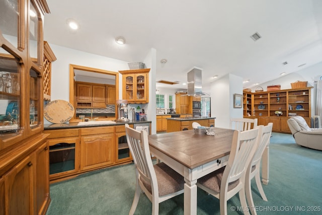 dining area featuring carpet flooring, recessed lighting, and visible vents