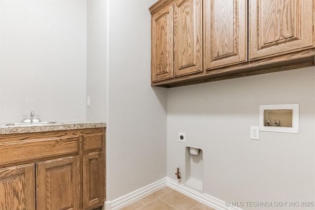 laundry room featuring gas dryer hookup, hookup for an electric dryer, cabinet space, baseboards, and hookup for a washing machine