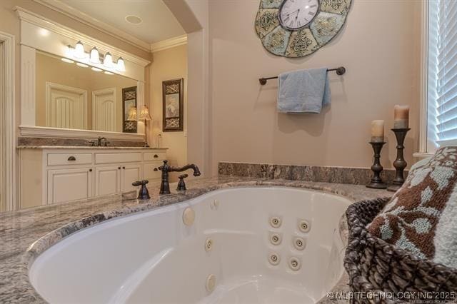 11615 S New Haven Ave, Tulsa, OK 74137 - full bath with a jetted tub, ornamental molding, and vanity