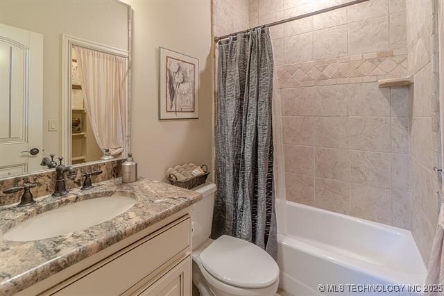 11615 S New Haven Ave, Tulsa, OK 74137 - bathroom with vanity, toilet, and shower / bath combination with curtain