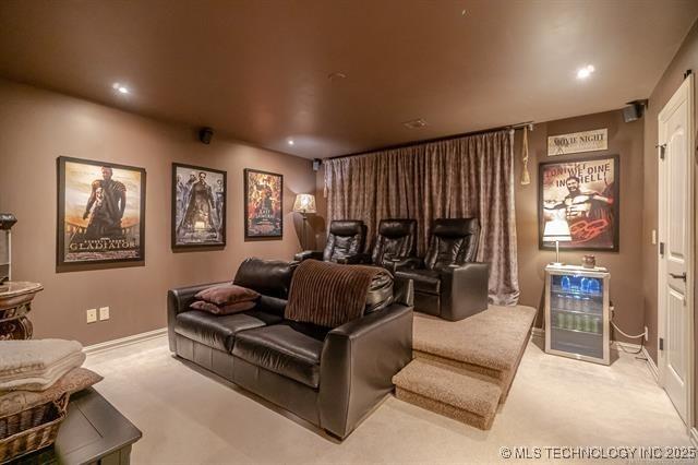 11615 S New Haven Ave, Tulsa, OK 74137 - carpeted home theater room with baseboards and recessed lighting