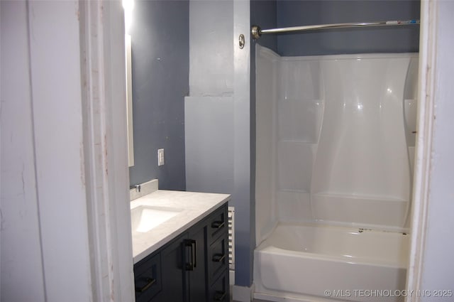full bathroom featuring shower / tub combination and vanity