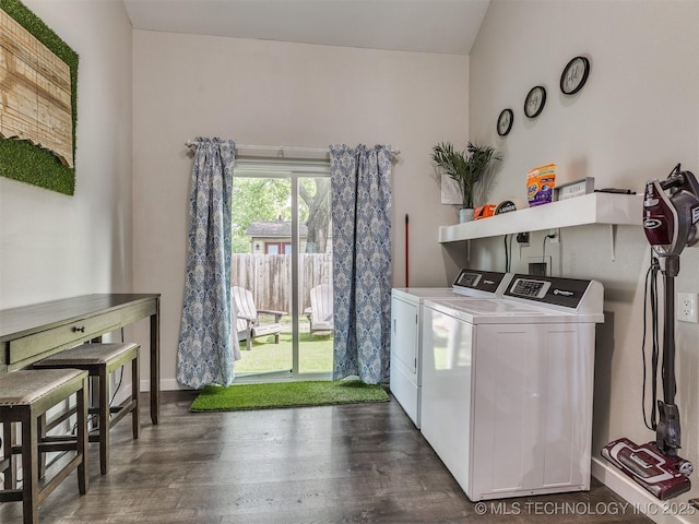 laundry room with dark wood-style floors and independent washer and dryer