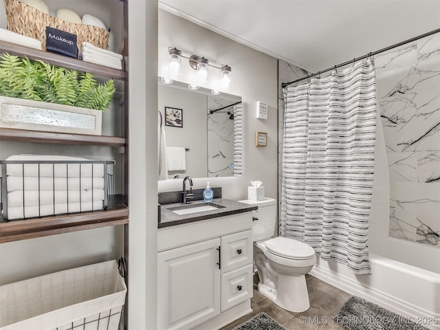 full bath with shower / bath combo with shower curtain, toilet, wood finished floors, and vanity