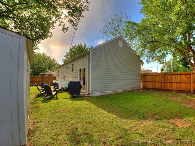 exterior space featuring a fenced backyard