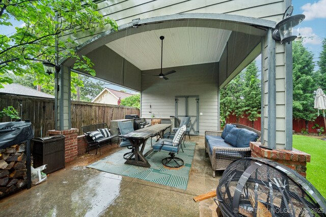 view of patio / terrace with an outdoor hangout area, a ceiling fan, outdoor dining area, and a fenced backyard
