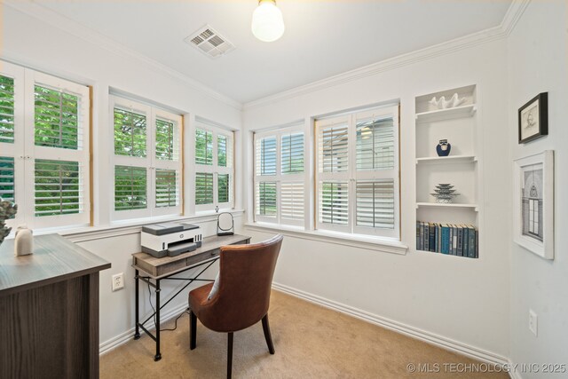 home office with baseboards, plenty of natural light, ornamental molding, and visible vents