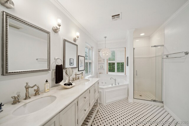 full bathroom featuring crown molding, a sink, a bath, and a shower stall