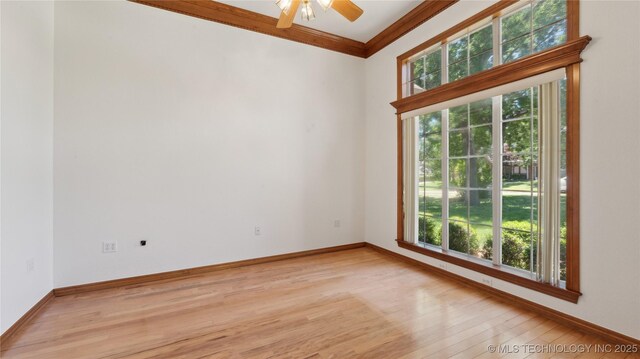 9219 N 134th E Ave, Owasso, OK 74055 - empty room with ornamental molding, light wood finished floors, baseboards, and a ceiling fan