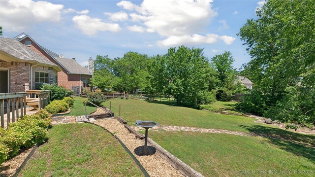 9219 N 134th E Ave, Owasso, OK 74055 - view of yard with a deck