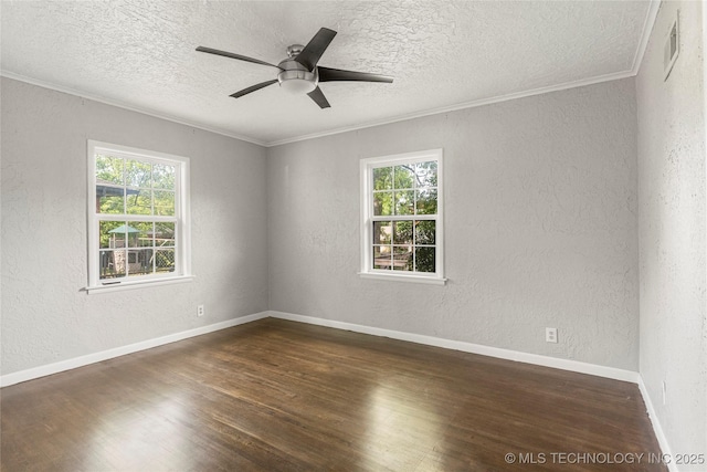 empty room featuring crown molding, a textured ceiling, and a textured wall