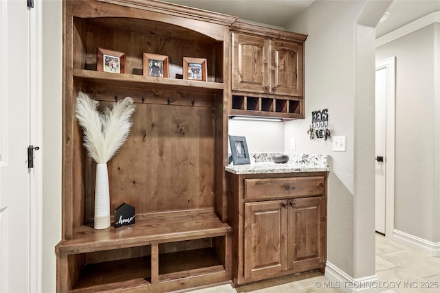 mudroom featuring baseboards