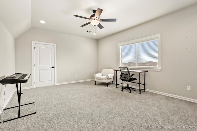 carpeted home office featuring baseboards, a ceiling fan, and visible vents