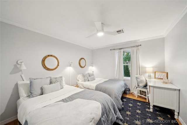 2252 S Troost Ave, Tulsa, OK 74114 - bedroom featuring a ceiling fan, visible vents, wood finished floors, baseboards, and ornamental molding