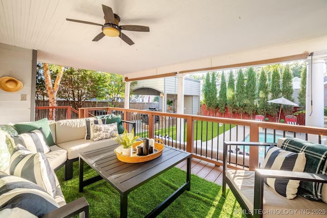 2252 S Troost Ave, Tulsa, OK 74114 - exterior space featuring a ceiling fan, an outbuilding, a fenced backyard, and an outdoor hangout area