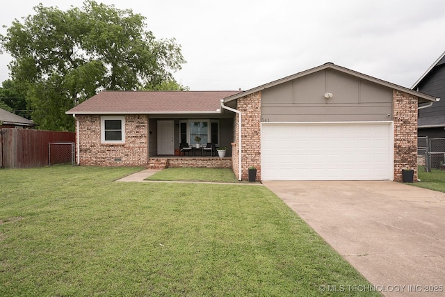single story home featuring fence, an attached garage, a front yard, and brick siding