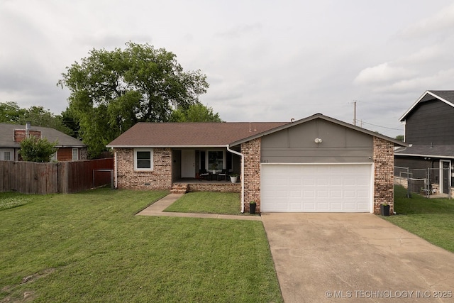 single story home featuring an attached garage, a front lawn, fence, and concrete driveway