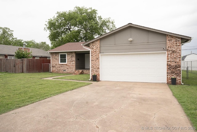 ranch-style house featuring fence, an attached garage, concrete driveway, and a front lawn