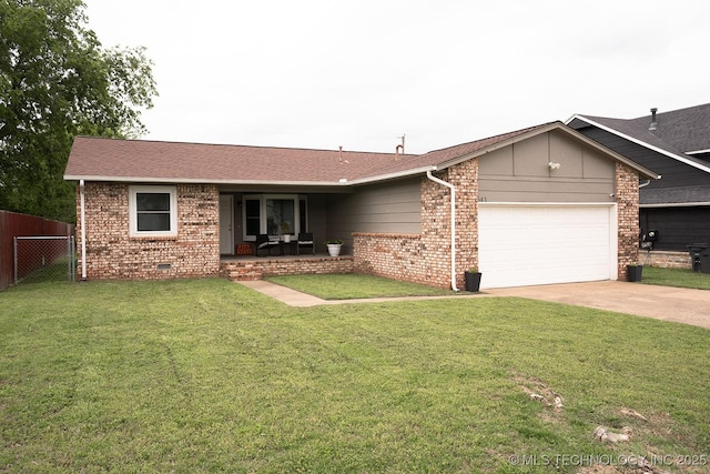 single story home featuring a garage, fence, a front yard, brick siding, and concrete driveway