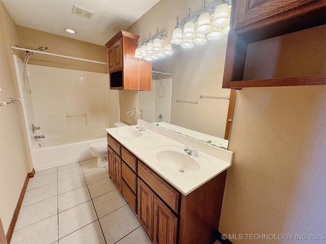 full bath featuring tile patterned floors, tub / shower combination, toilet, double vanity, and baseboards
