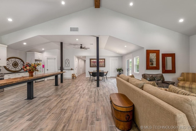 living room featuring visible vents, beamed ceiling, light wood-style floors, ceiling fan, and recessed lighting
