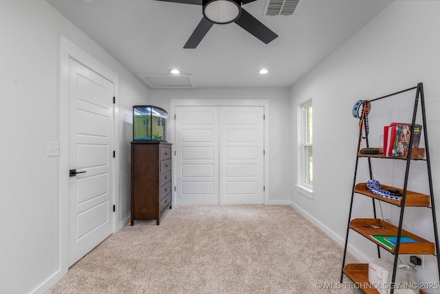 carpeted bedroom featuring attic access, visible vents, baseboards, a closet, and recessed lighting