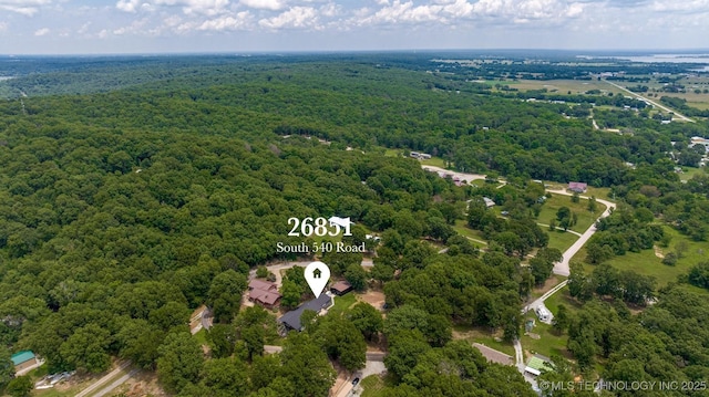 bird's eye view featuring a view of trees