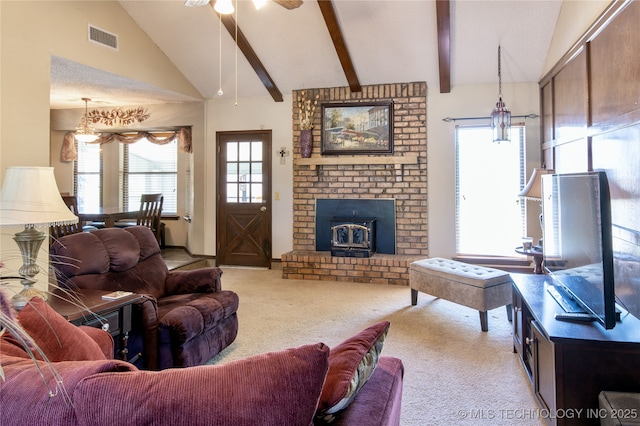 living room with carpet flooring, lofted ceiling with beams, a ceiling fan, baseboards, and visible vents