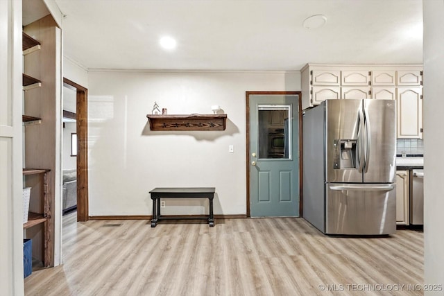 4604 Maple Dr, Sand Springs, OK 74063 - kitchen featuring crown molding, stainless steel appliances, and light wood-style flooring