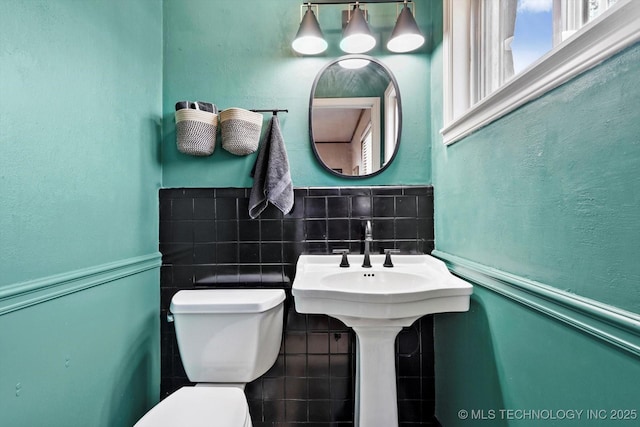 4604 Maple Dr, Sand Springs, OK 74063 - half bathroom with toilet and tile walls