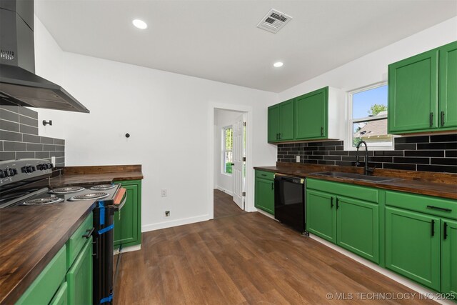 kitchen with dishwasher, electric range oven, wood counters, wall chimney exhaust hood, and visible vents