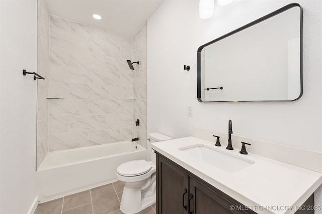 full bathroom featuring toilet, tile patterned floors, shower / bathing tub combination, and vanity