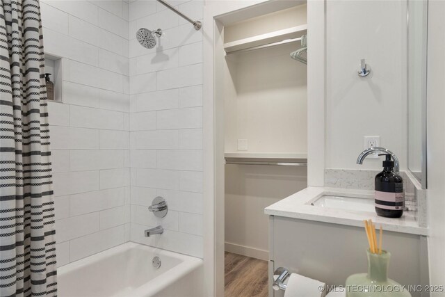 3504 E 30th Pl, Tulsa, OK 74114 - full bath featuring a sink, shower / bathtub combination with curtain, and wood finished floors
