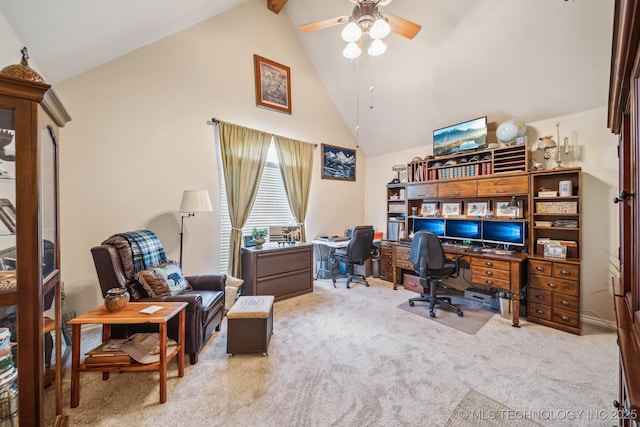 carpeted office space with ceiling fan, beam ceiling, and high vaulted ceiling