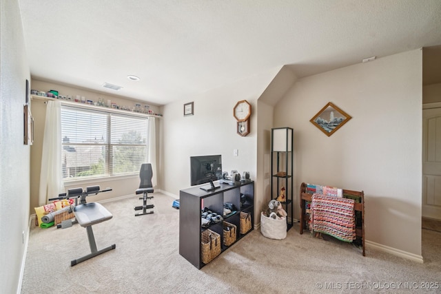 office space with visible vents, carpet, and baseboards