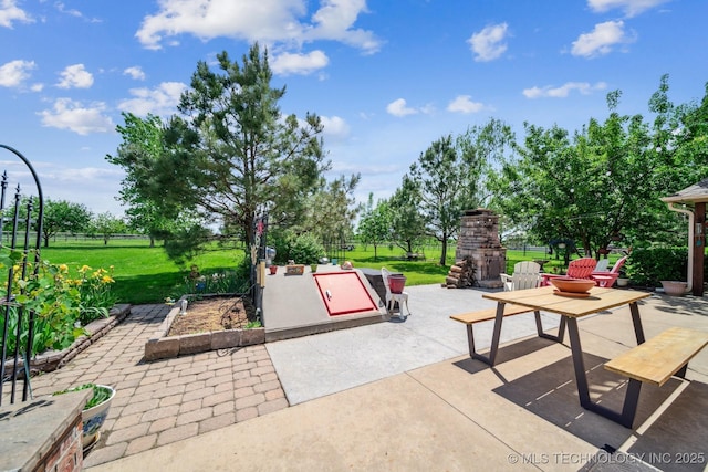 exterior space with a yard, a patio, and fence