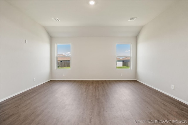 29327 E 80th St SE, Broken Arrow, OK 74014 - spare room featuring visible vents, baseboards, dark wood finished floors, and vaulted ceiling
