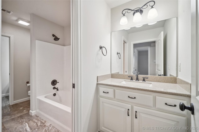full bathroom with visible vents, vanity, tub / shower combination, toilet, and baseboards